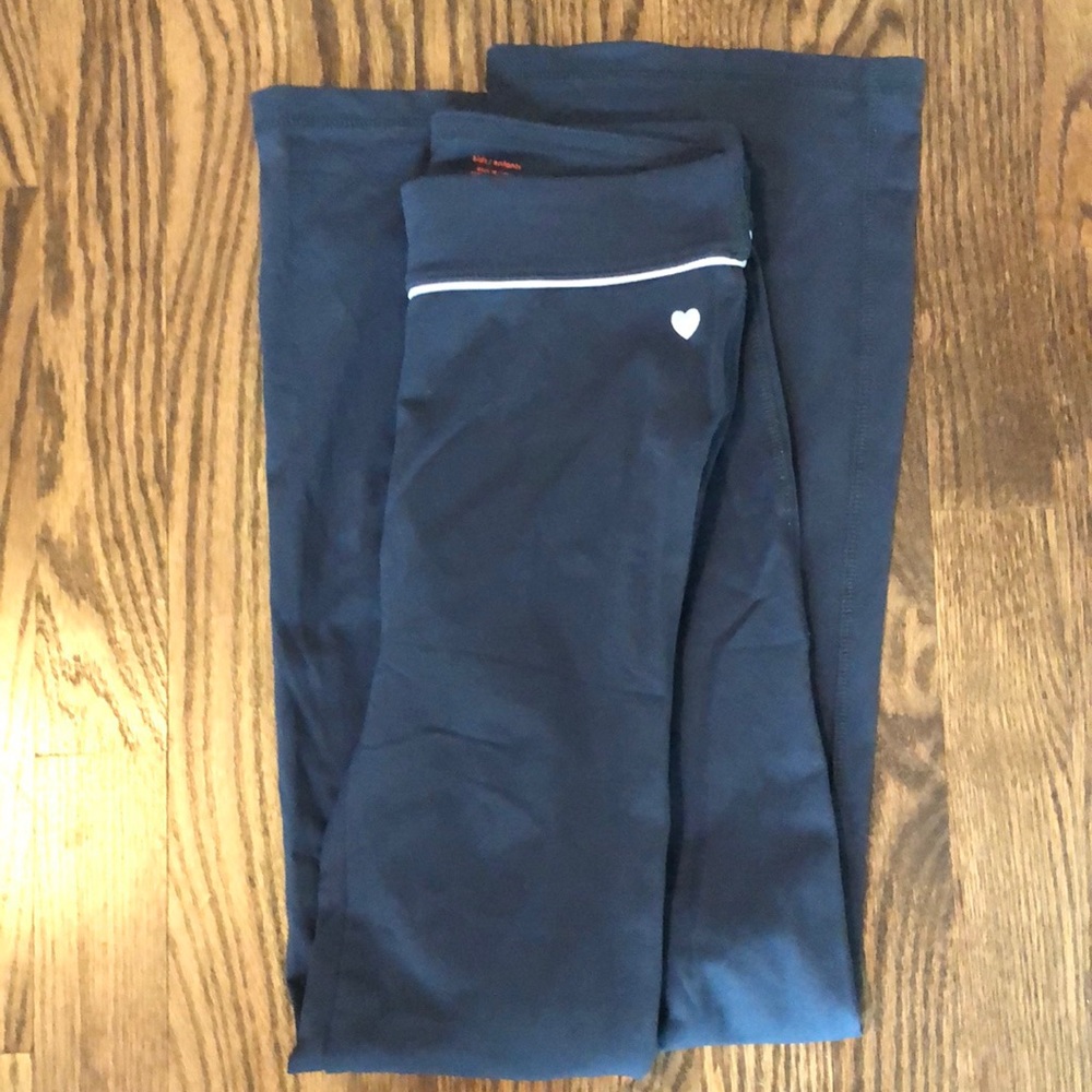 Kids size 10/12 yoga pants with heart on corner